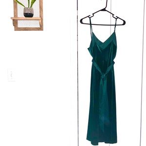 Emerald green velvet midi dress